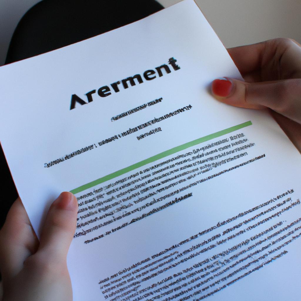 Person holding a rental agreement