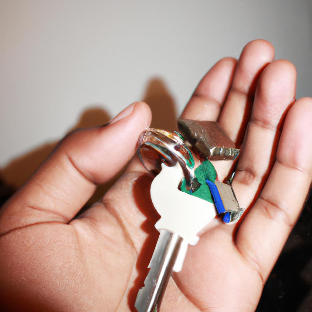 Person holding a house key
